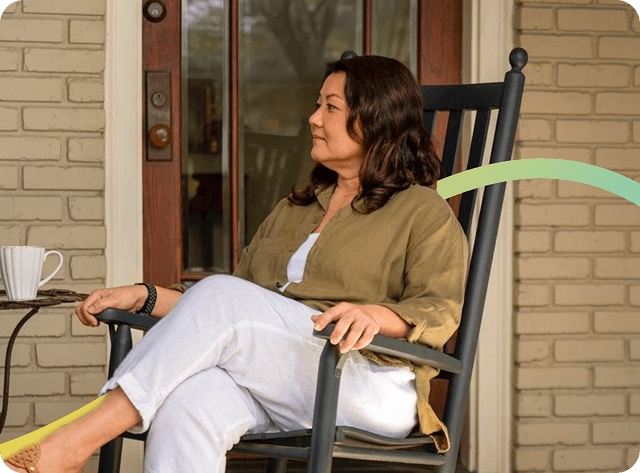 Liz sitting in rocking chair